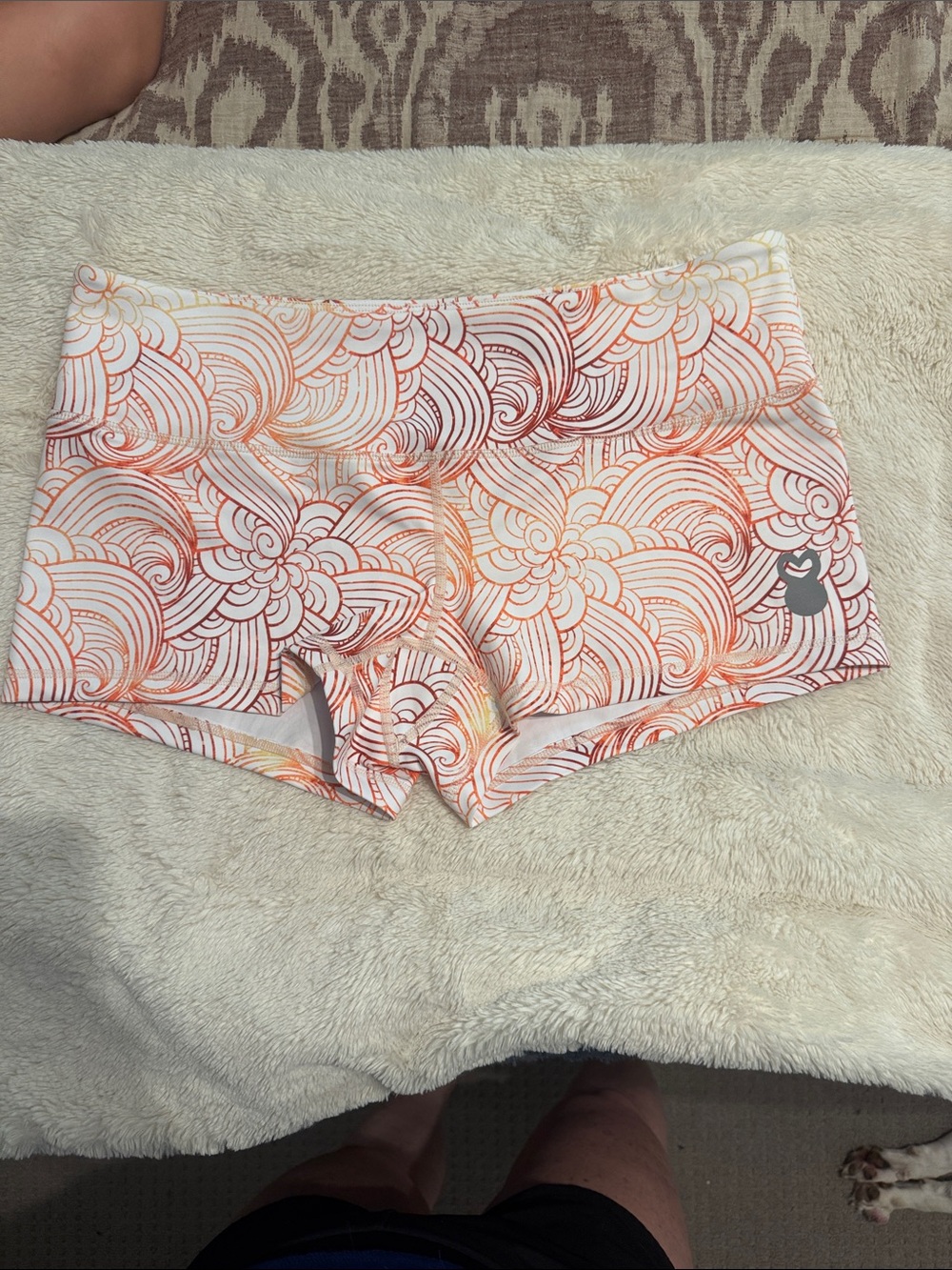 White Athletic Shorts with Orange Floral Swirl Print